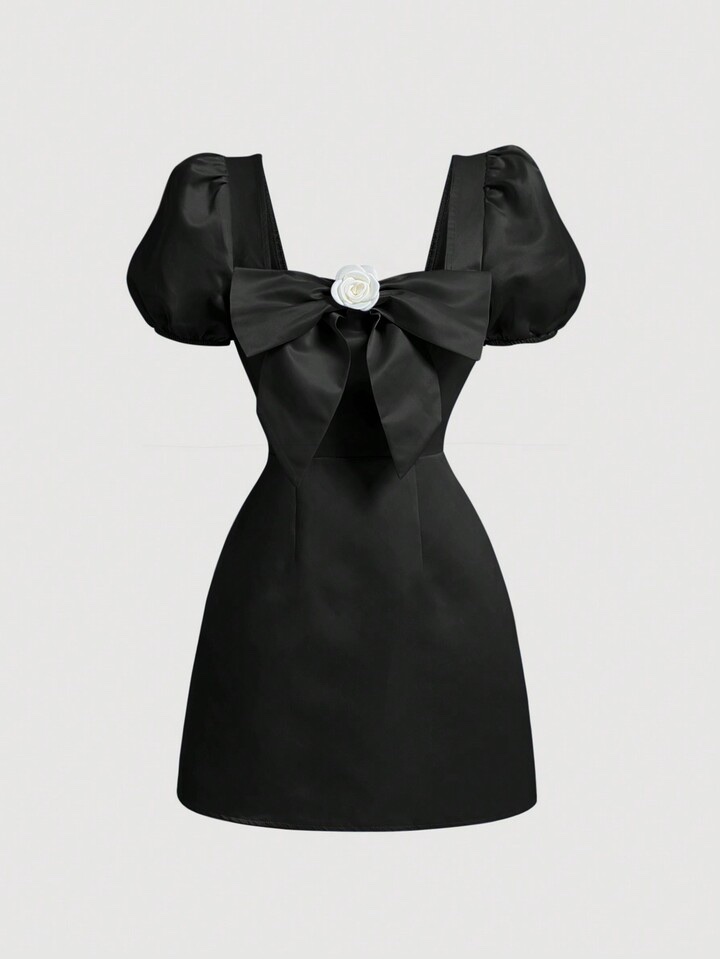 Vestido negro con moño