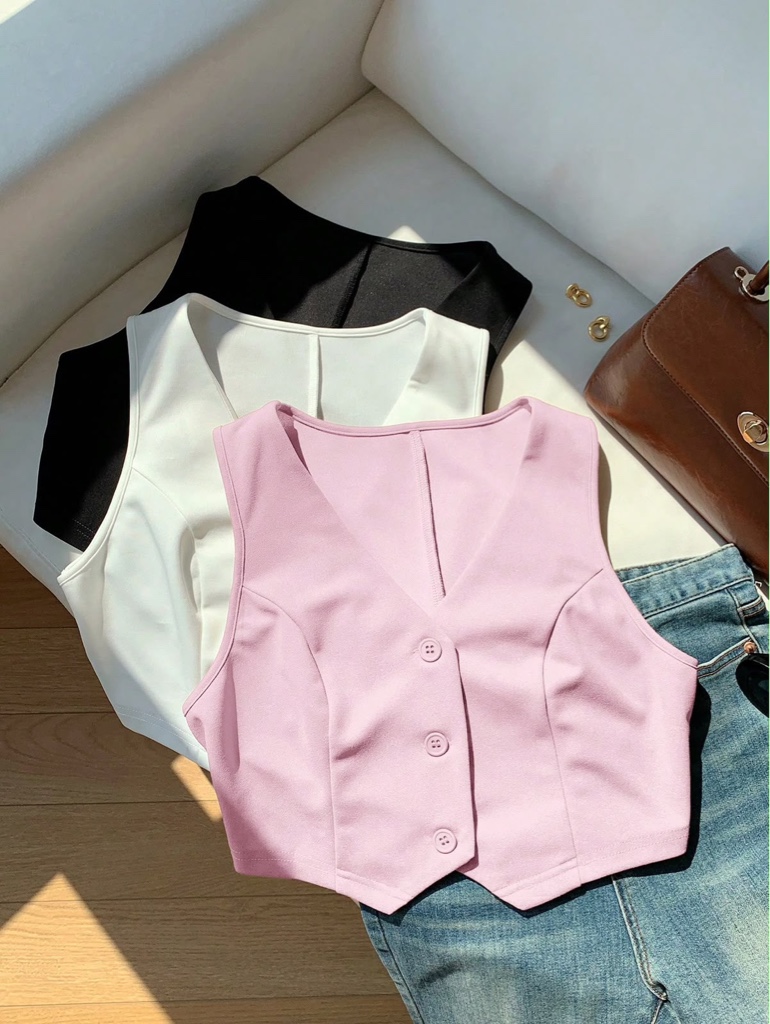 Blusa tipo chaleco rosada blanca negro