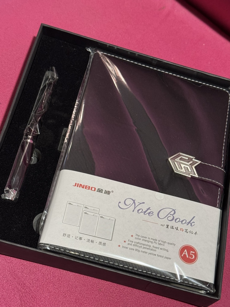 Libreta + bolígrafo