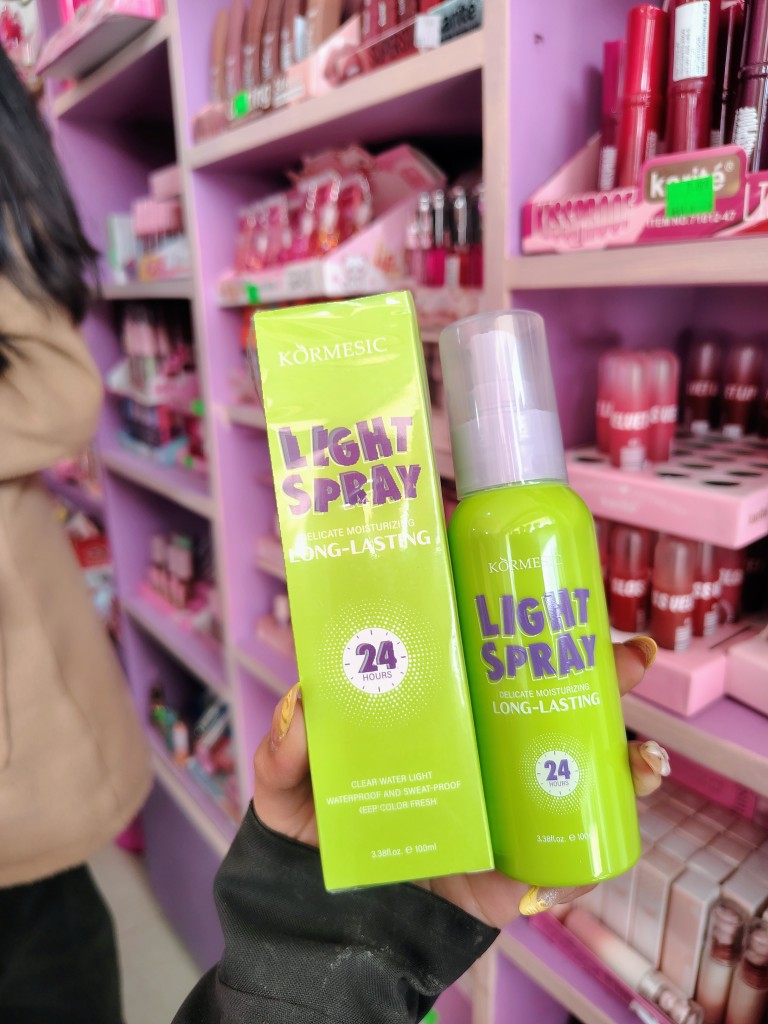 fijador light spray