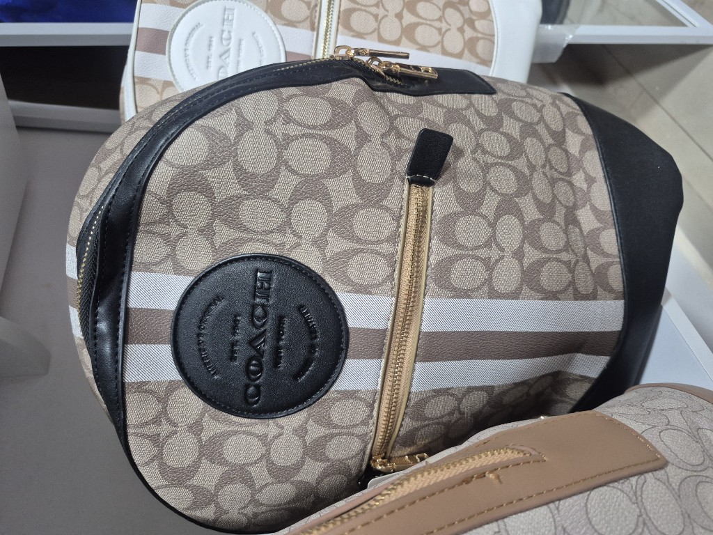 Coach morral beige