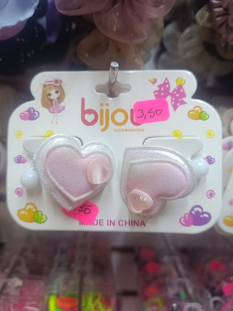 Coleta liga corazón niña