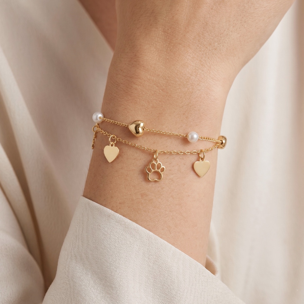 Pulseira dourada corações e pata