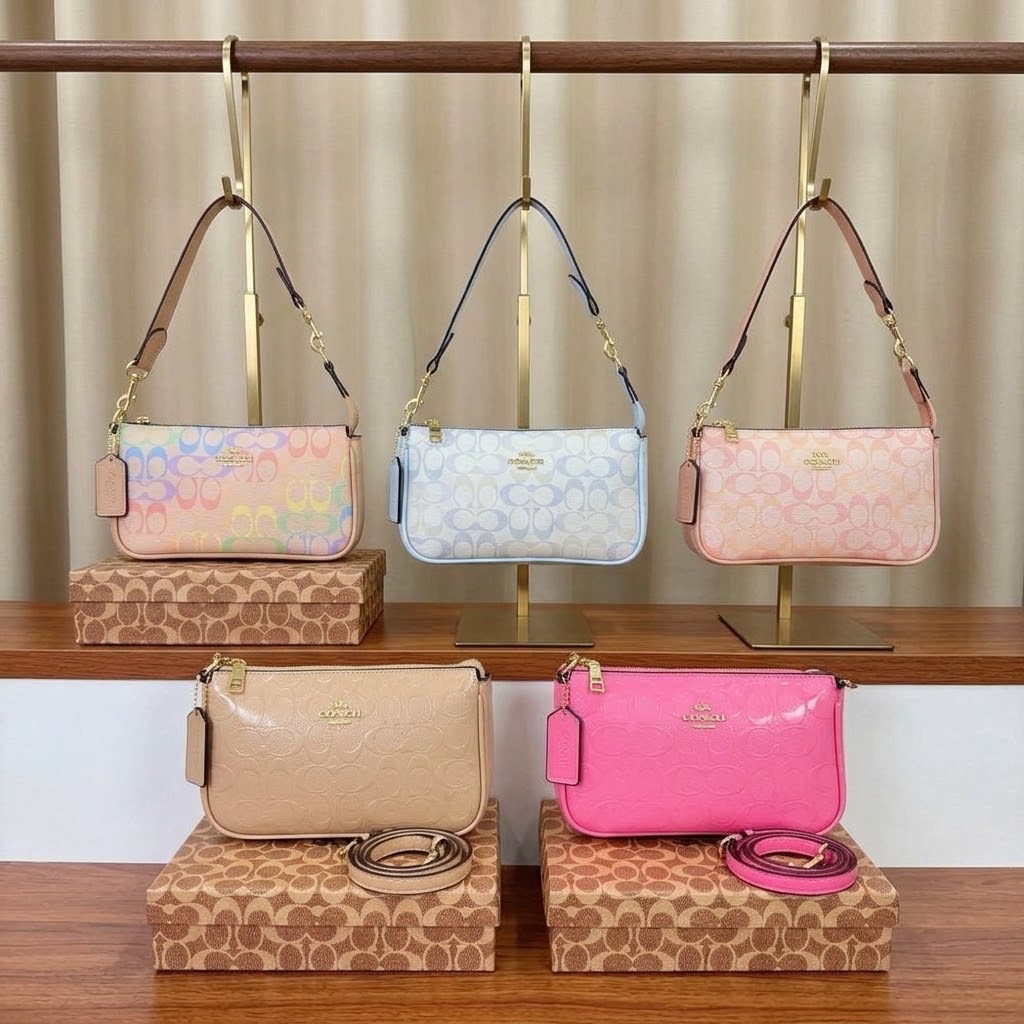 Coach Nolita 19 in blocked signature canvas