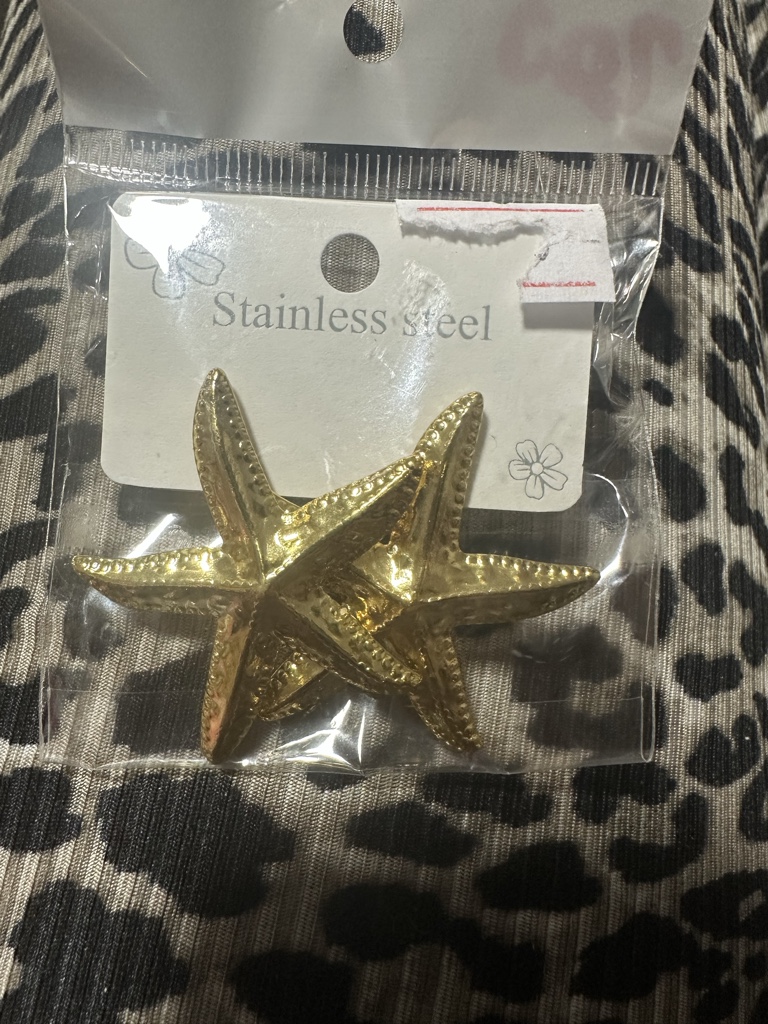 Estrella dorada metálica caravana