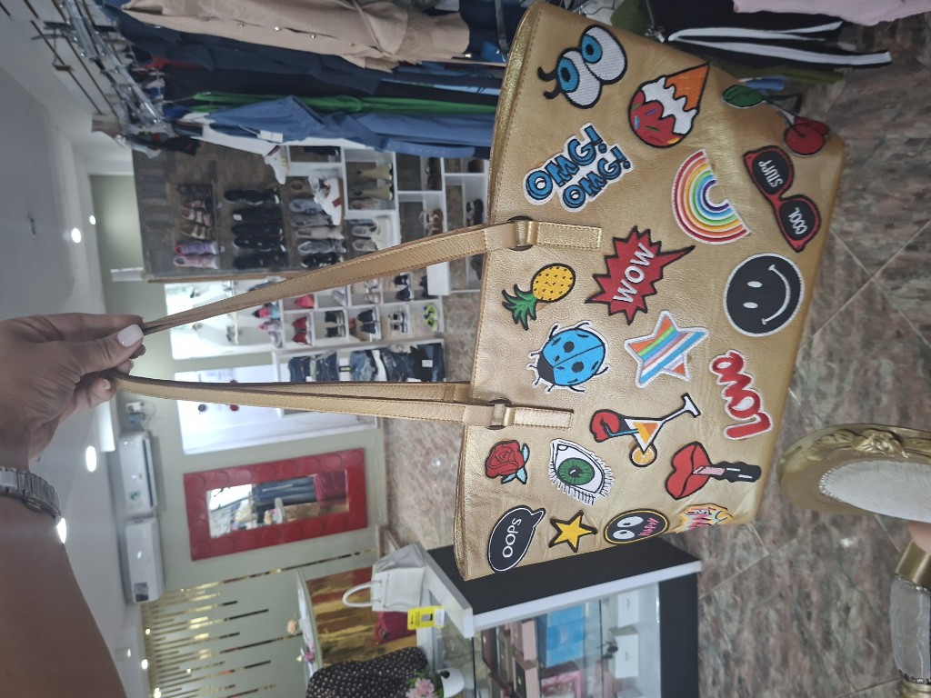 CARTERA DORADA DE STIKER BARBACANE