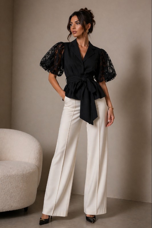 Blusa de malla con mangas abullonadas y cinturón