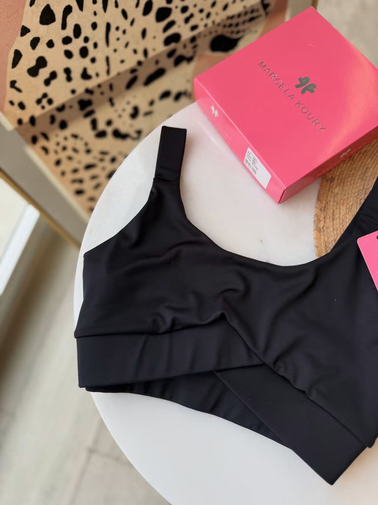 Top deportivo negro Marcela Koury 
Negro y nude