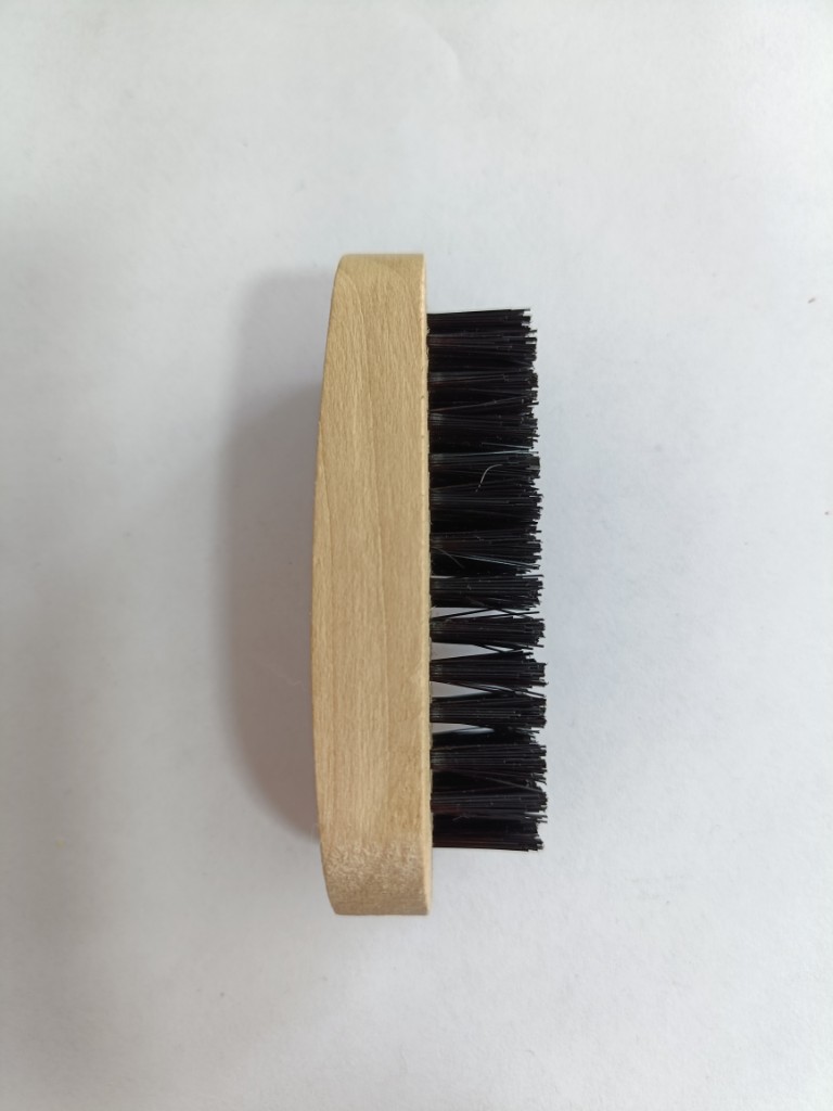 Cepillo de madera negro