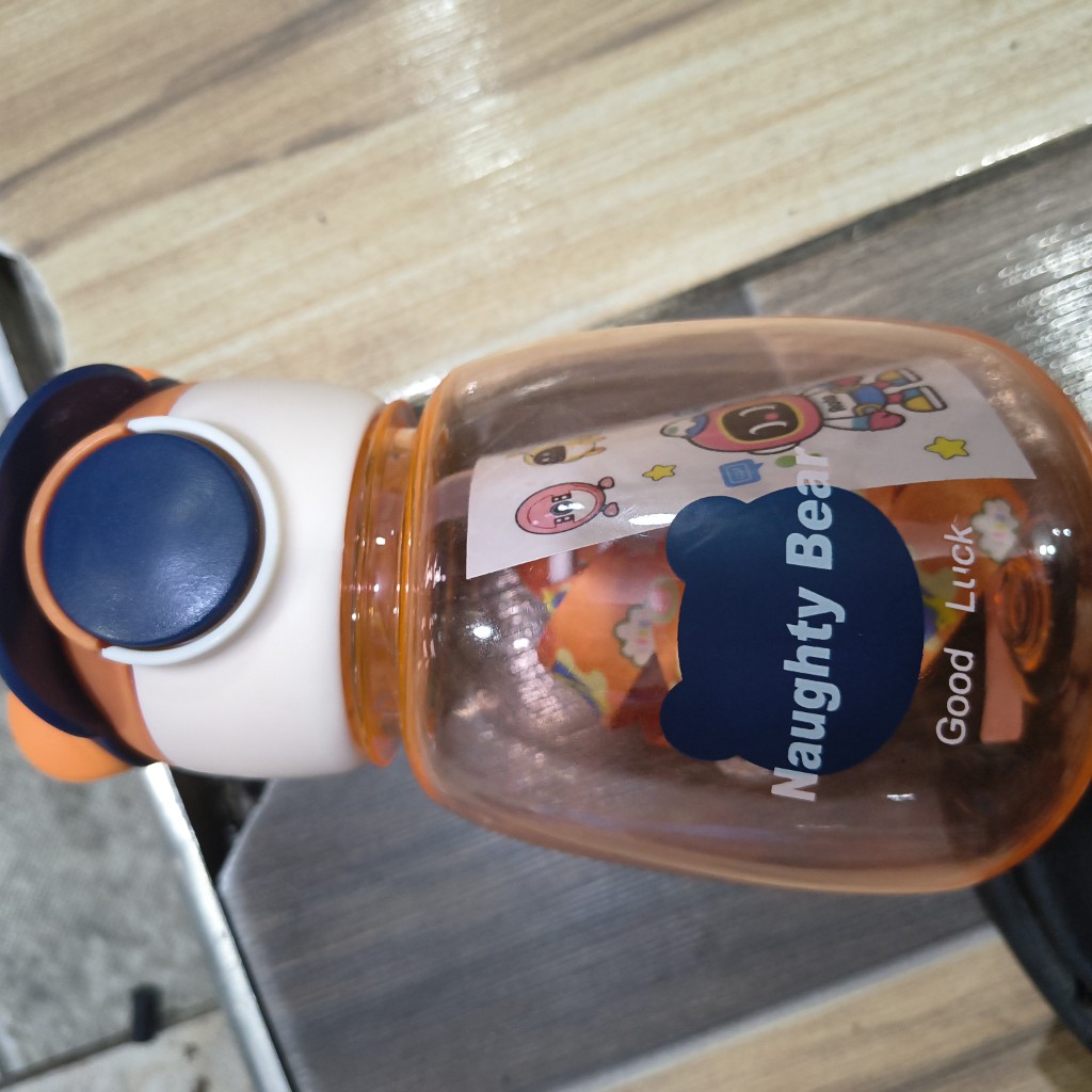 Naughty Bear botella naranja