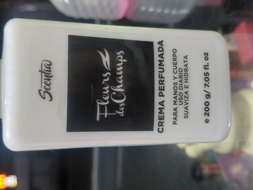 Crema perfumada scentia flores de champs 7.05oz.