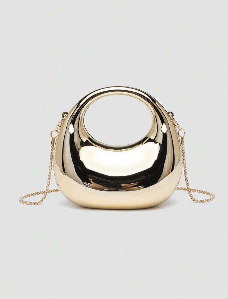 Cartera dorada de mano