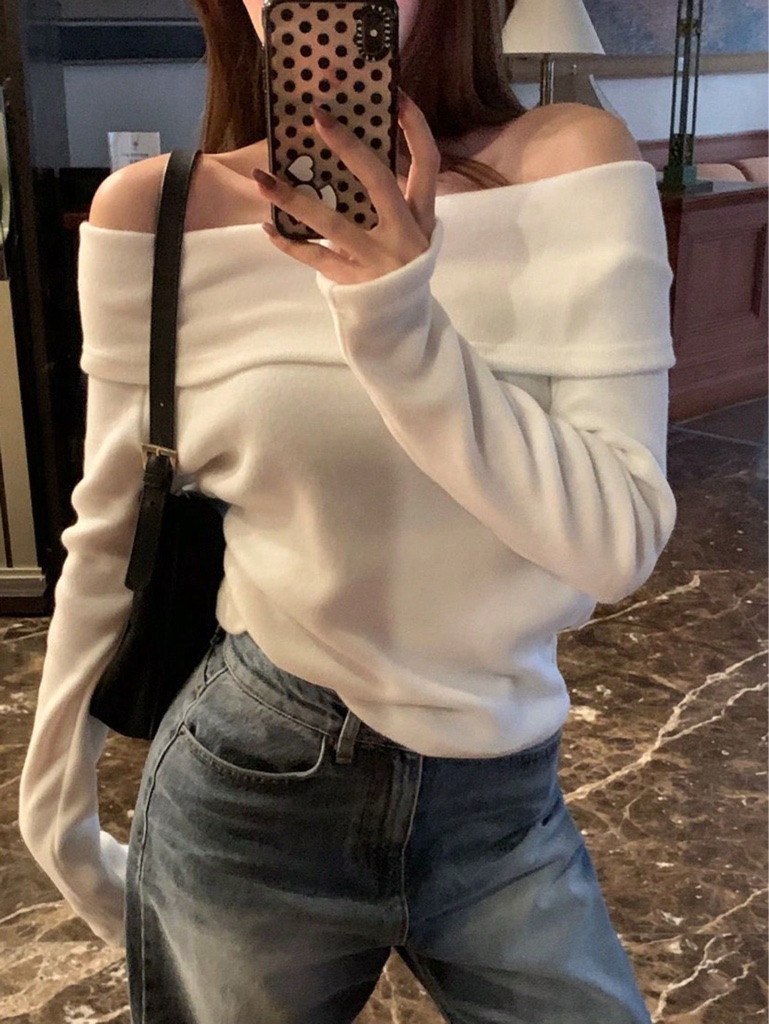 Suéter beige a los hombros
