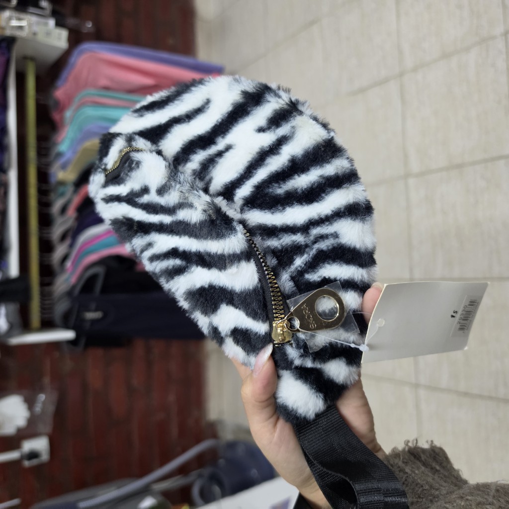 Soda riñonera animal print
