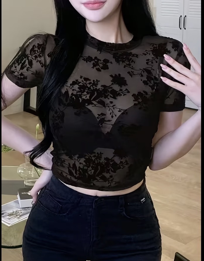 Top negro transparente floral