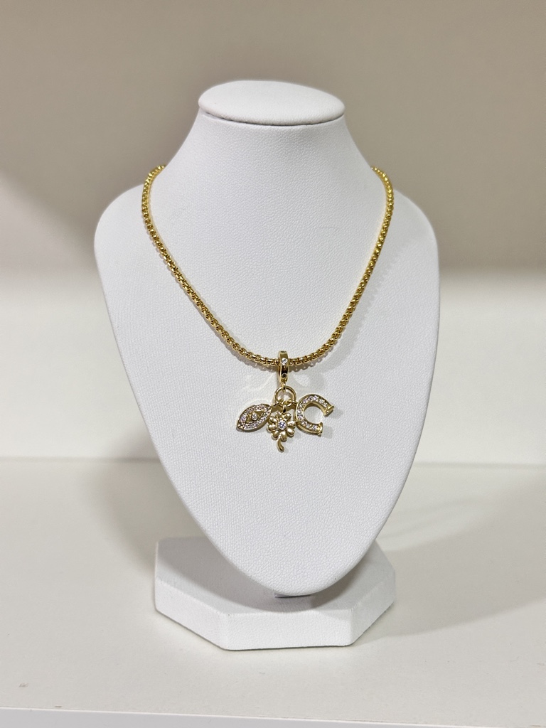 Collar herradura, ojo y flor