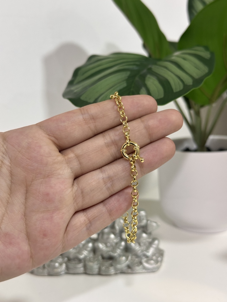 Pulsera rolo con broche timón