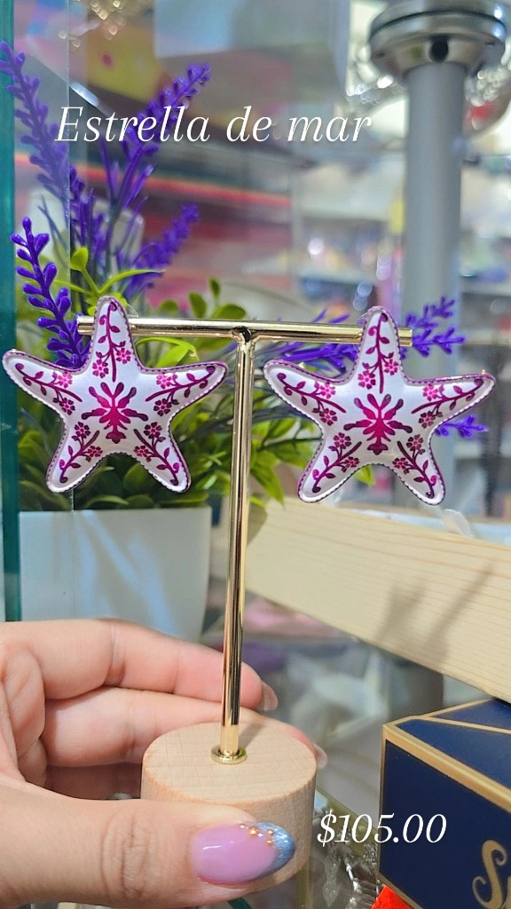 Aretesde estrella de mar rosa