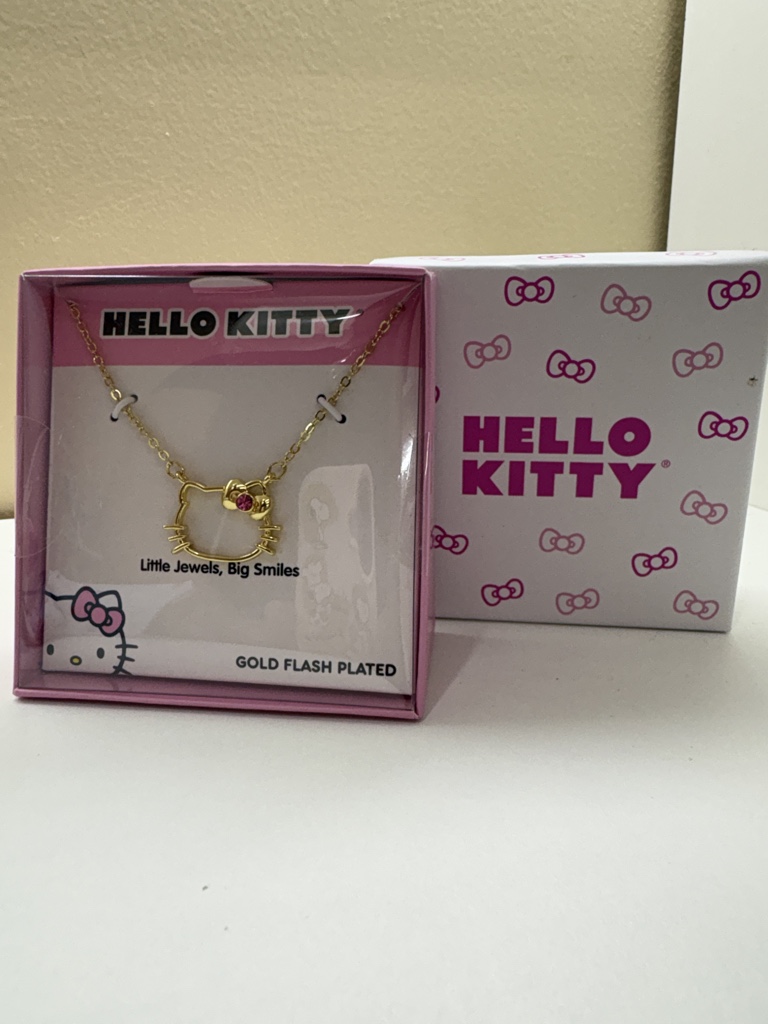 Hello Kitty collar dorado