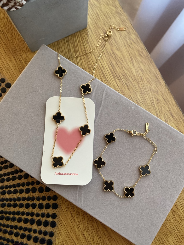 Set van cleff negro y dorado