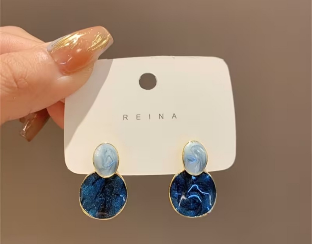 Reina aros azules