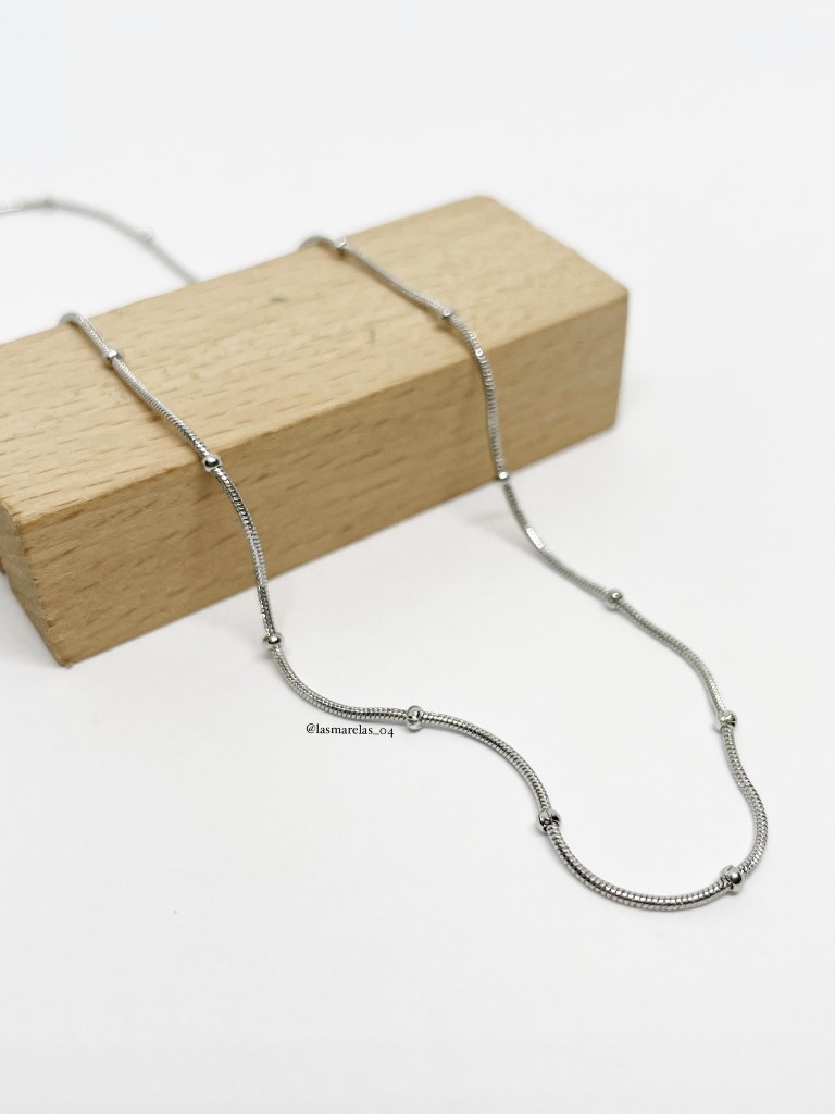 Cadena de puntos pequeños
