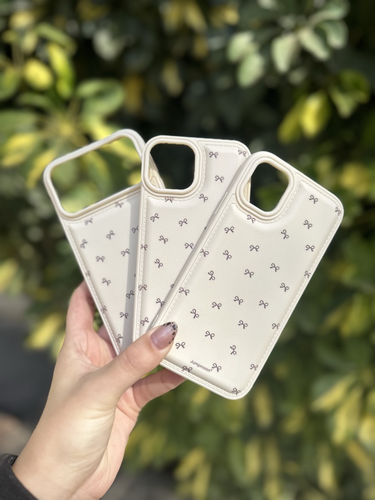 Funda beige con moñitos
