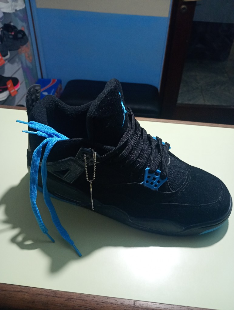 Jordan 4 retro black and blue electric