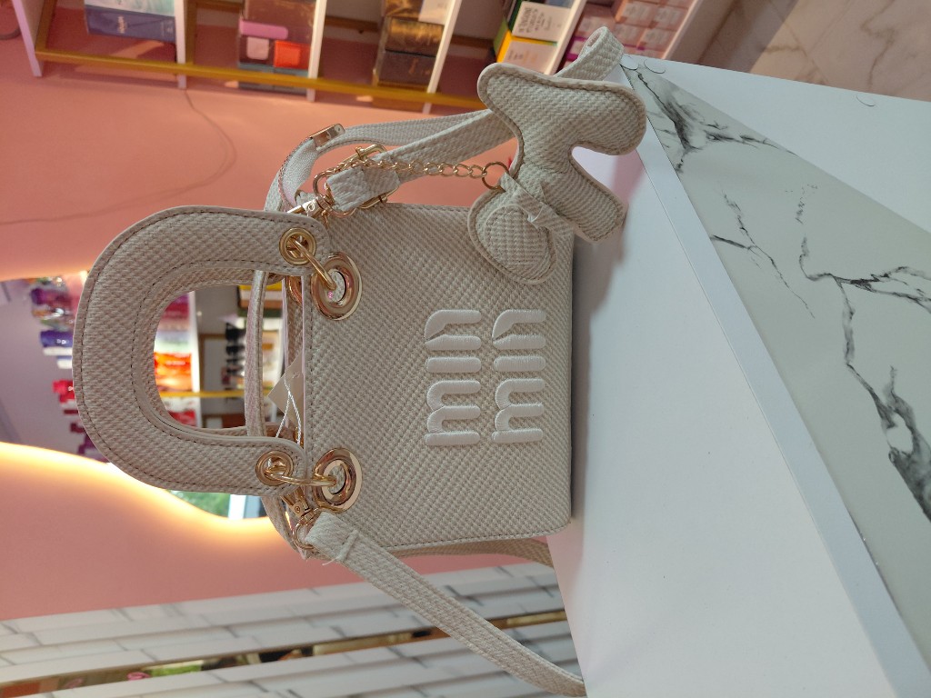 Mum beige bolso