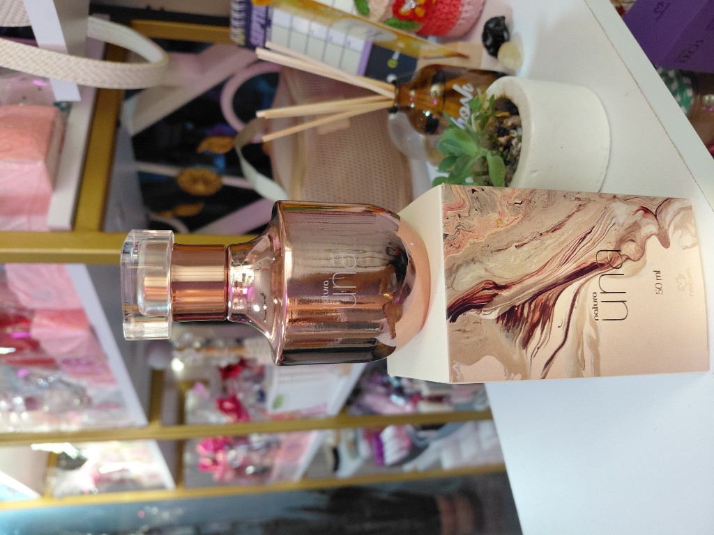 Natura Una perfume rosado