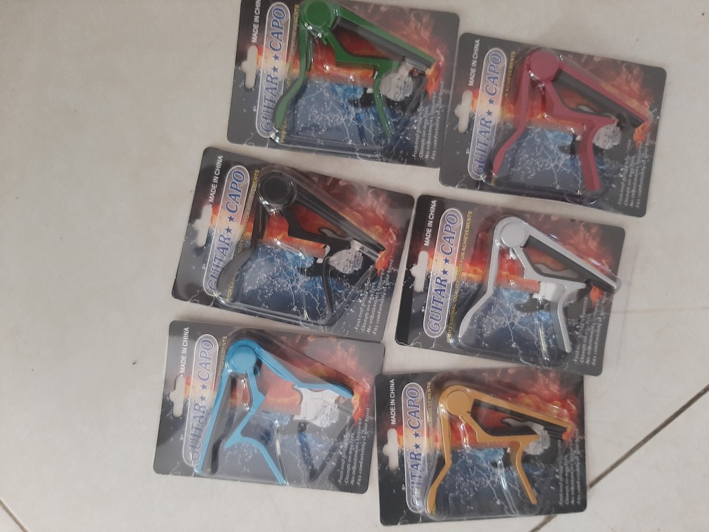 Capo para guitarra