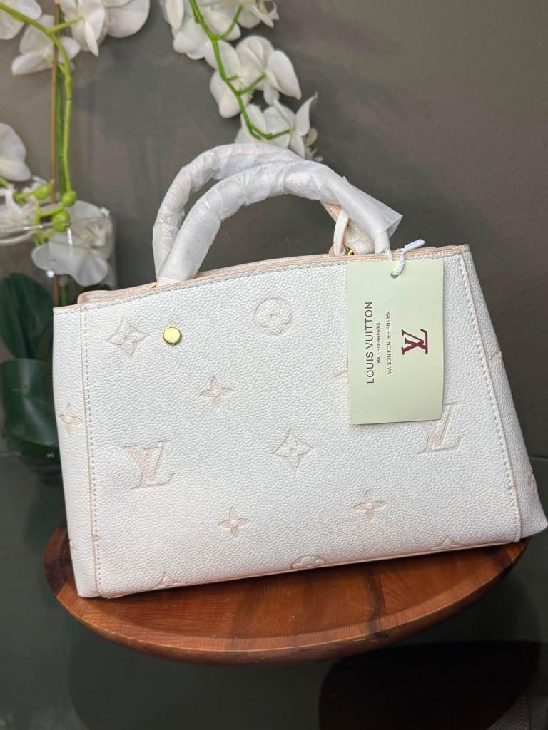 Cartera Louis vuitton chica