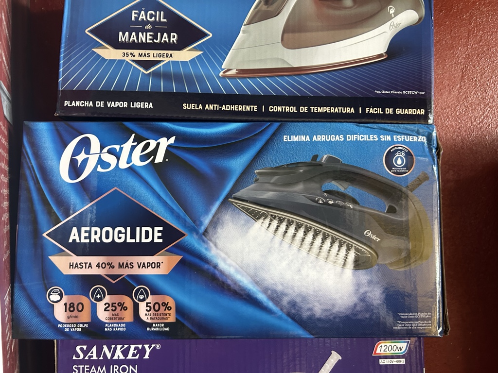 Oster plancha de vapor negra 702