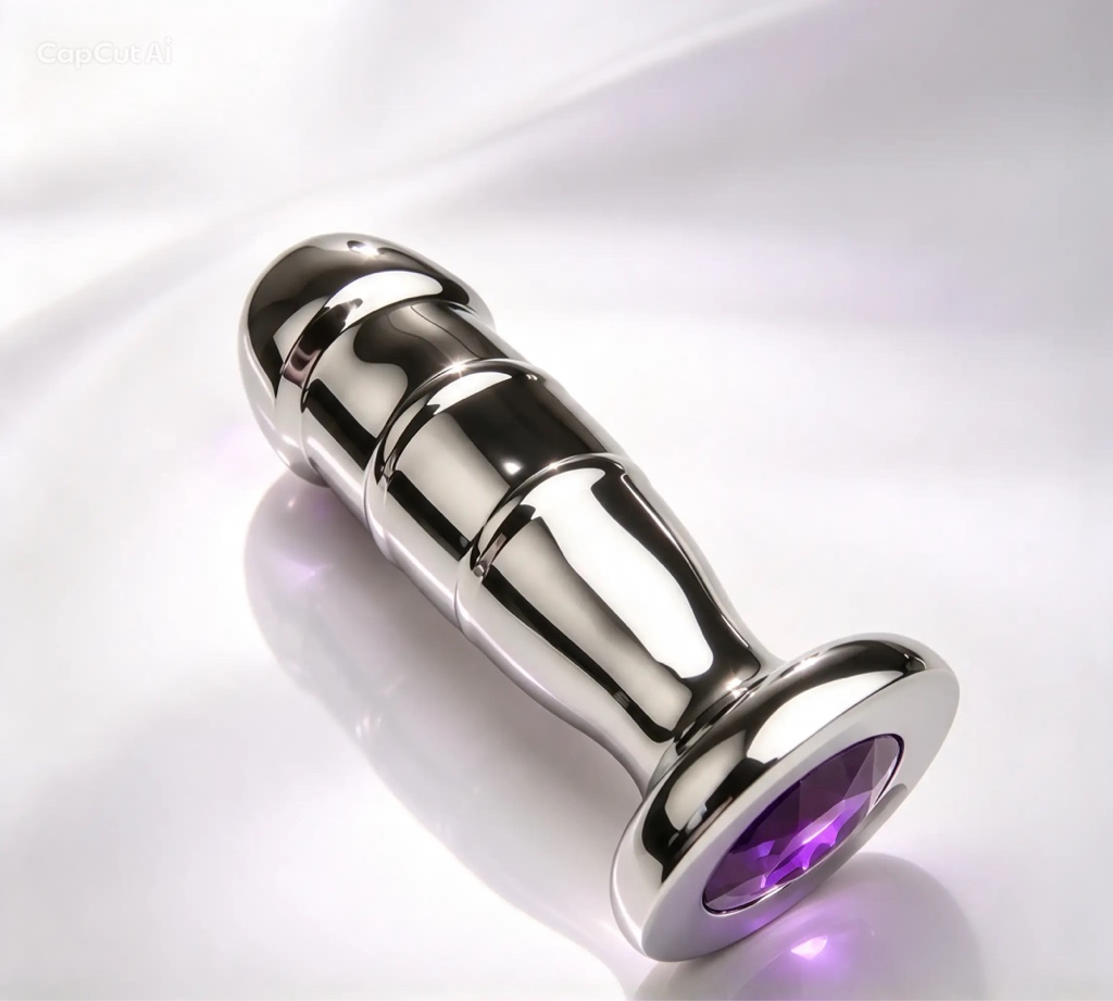 Plug metálico cromado en forma de pene talla M