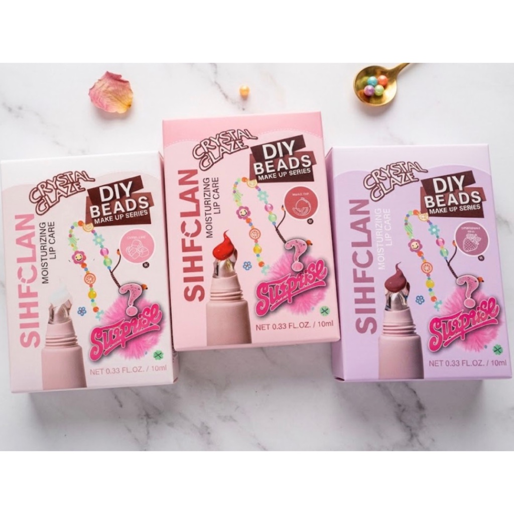 Crystan Glaze brillo labial con color + pulsera