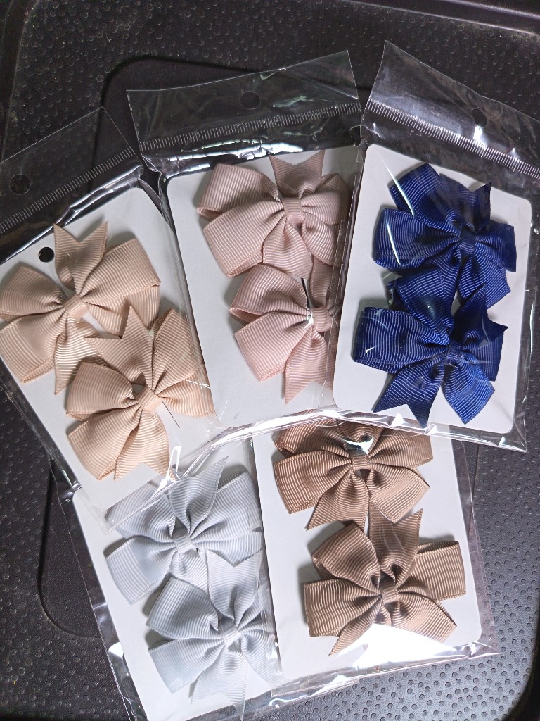 Moños con clip surtidos