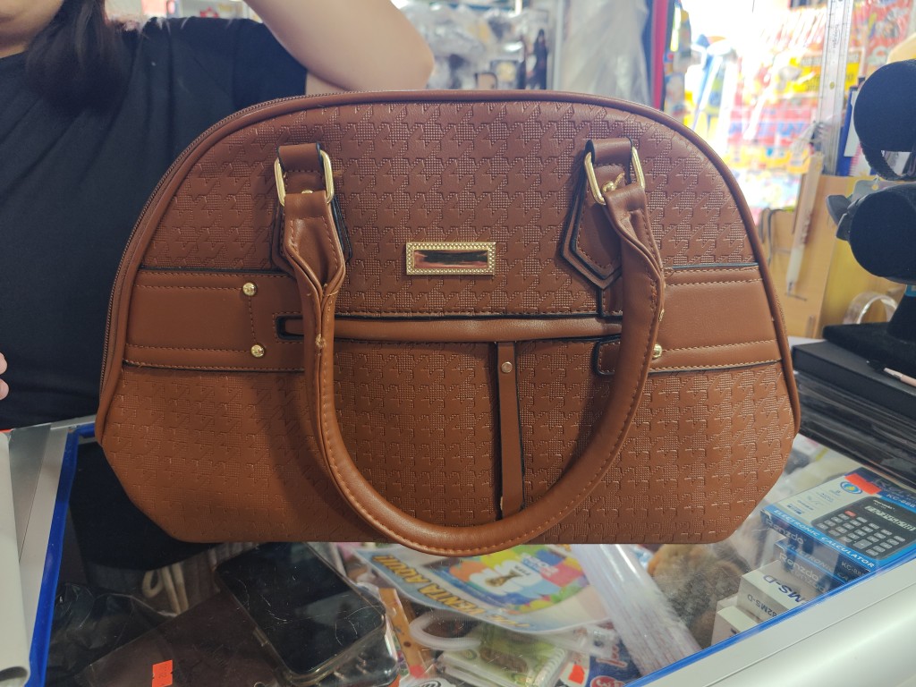Cartera ovalada