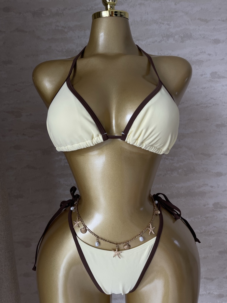 Bikini amarillo pastel bordes marrón