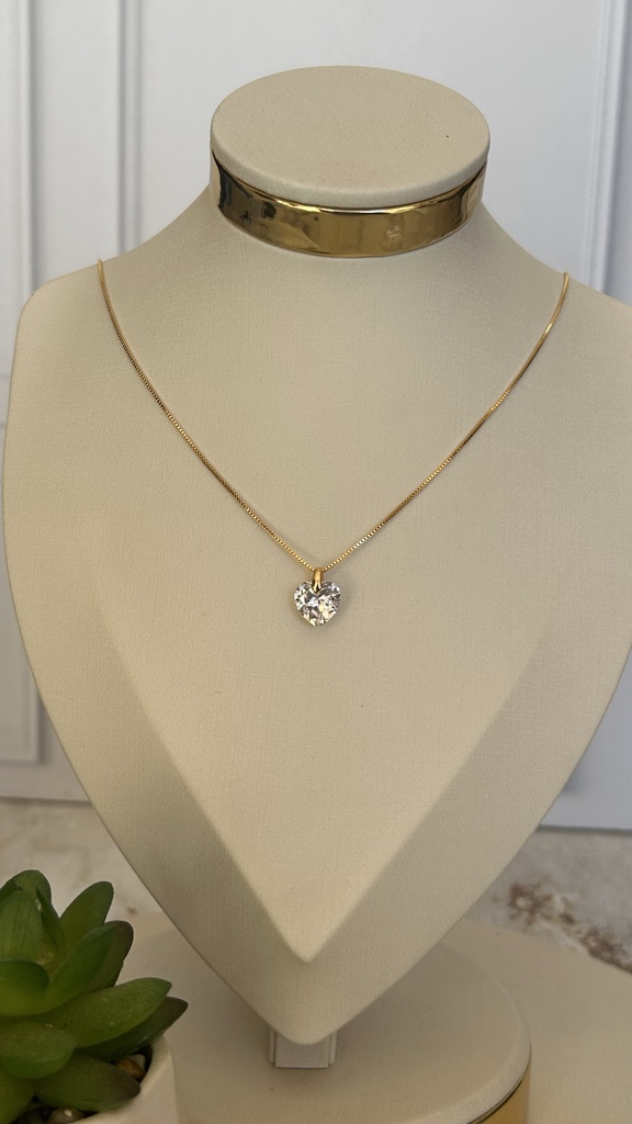 Collar dorado punto luz corazón