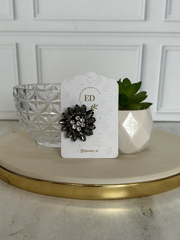 ED broche negro flor