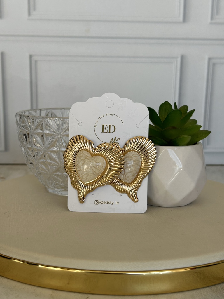 corazón dorados mármol
