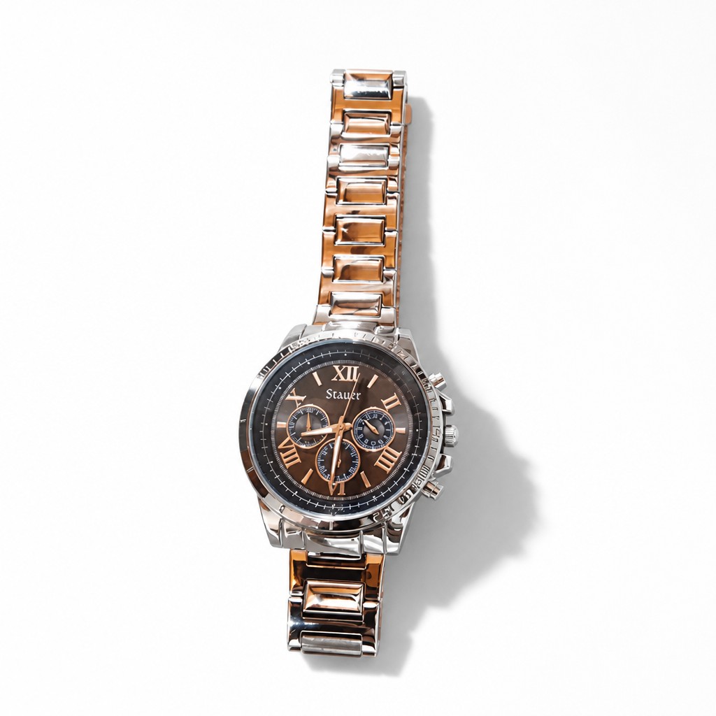 Reloj Masculino Stauer. Fondo azul, malla metal plaeado