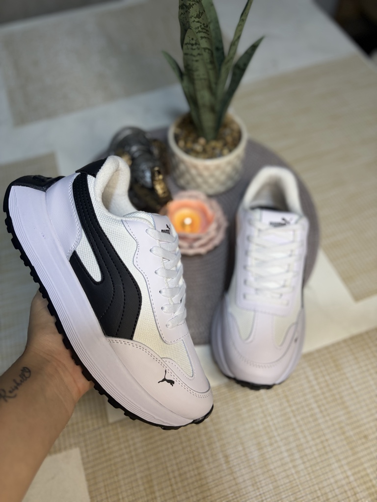 Puma blanco x negro
