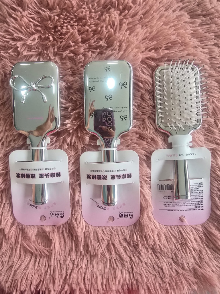 Cepillo para cabello con diseño de lazos