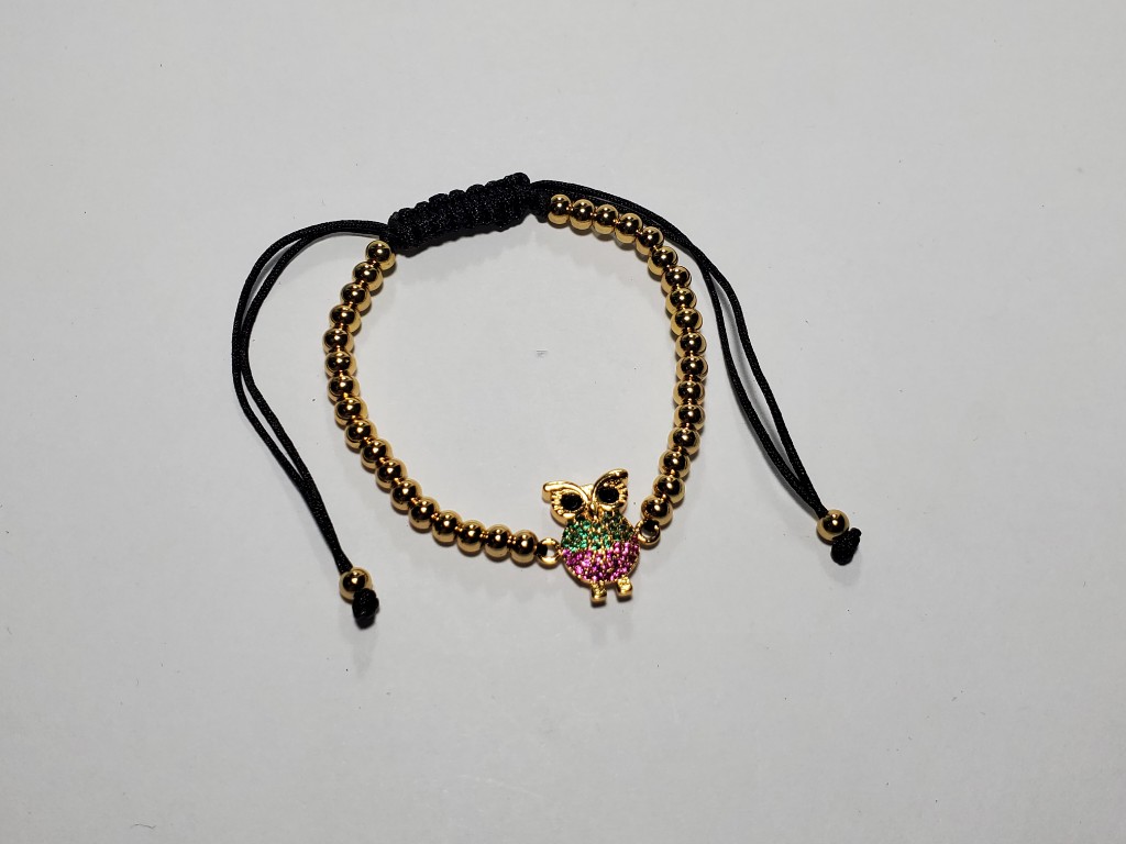 Pulsera dorada buho