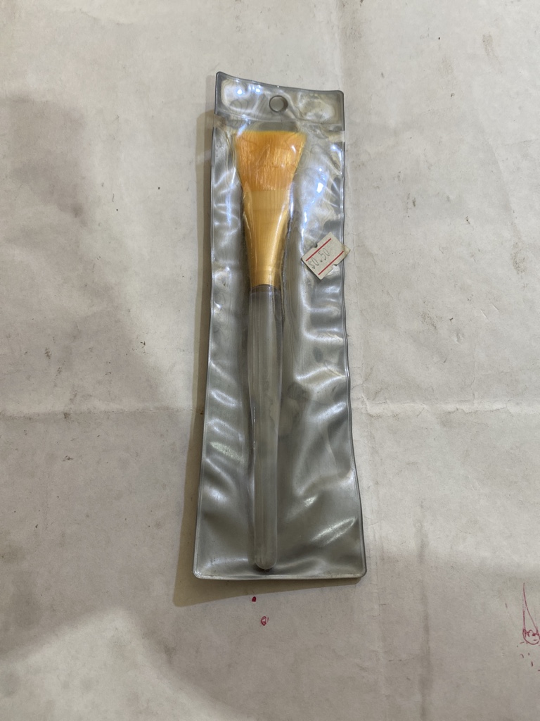 Brocha facial naranja