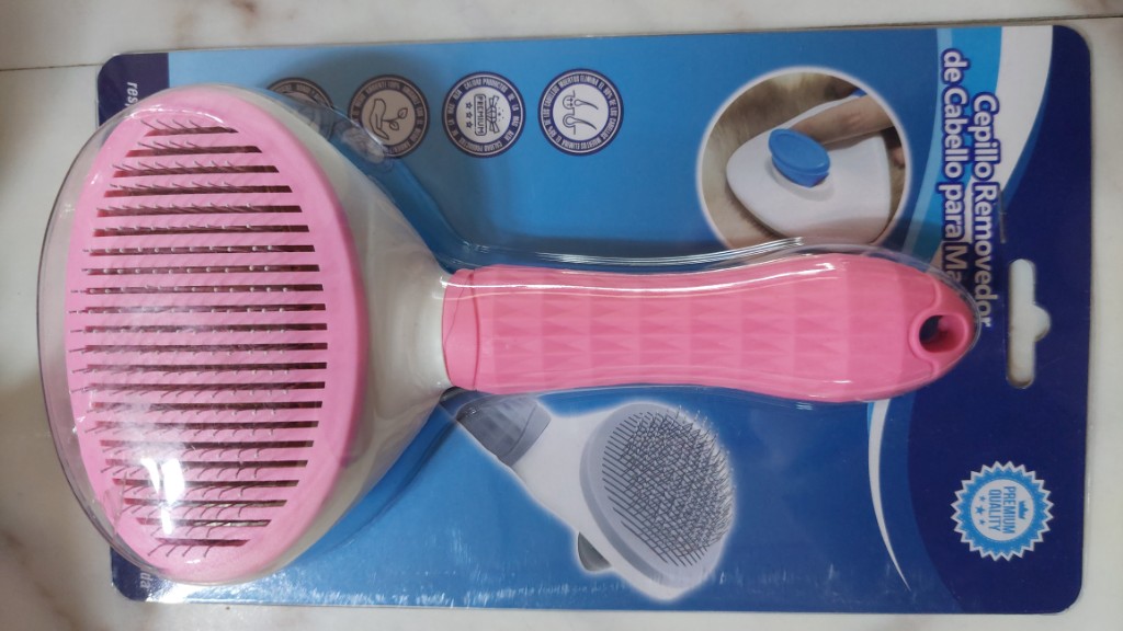 Cepillo para mascotas rosado
