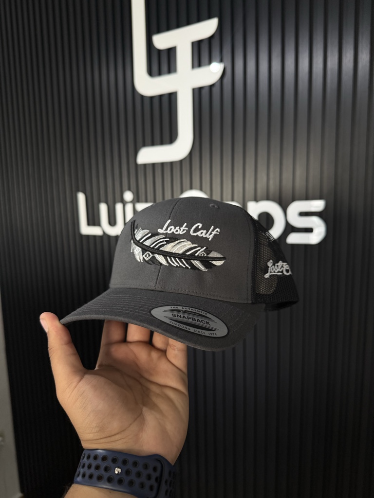 PLUMA GRIS VAQUERA