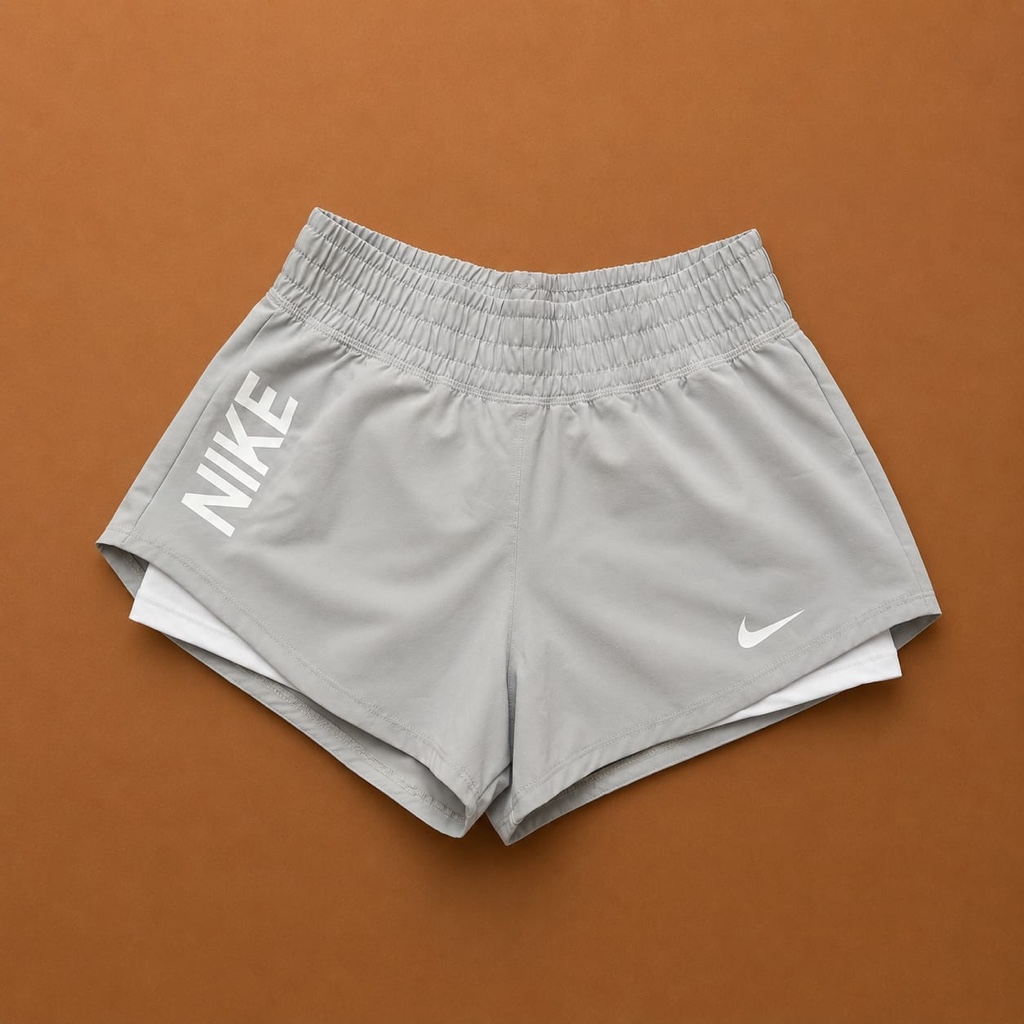 Pantaloneta Nike logo gris