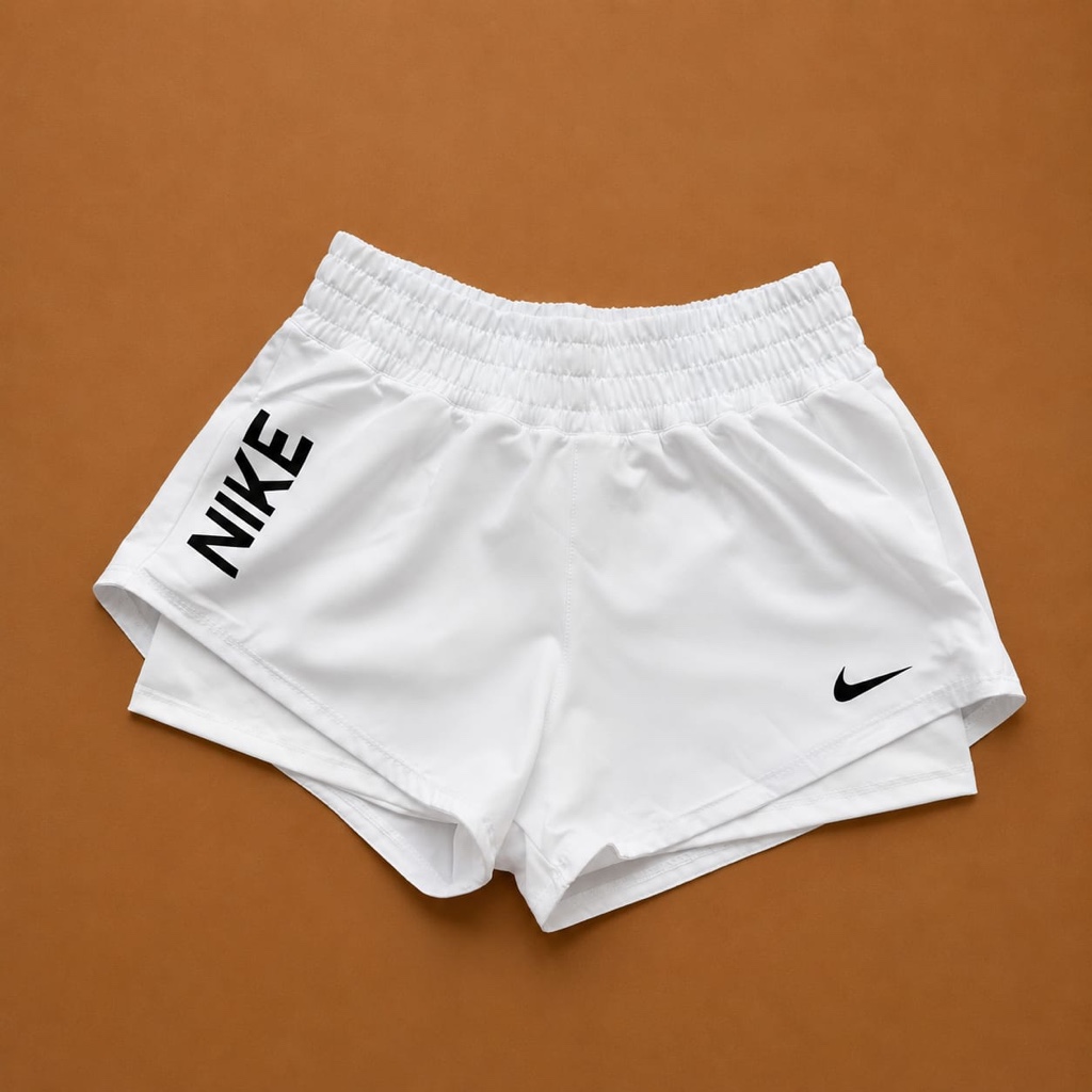 Pantaloneta Nike logo blanco